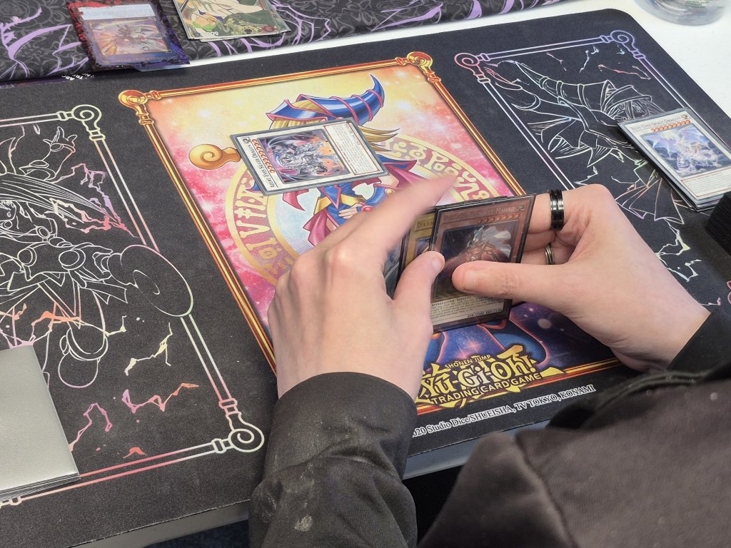 A hand being played at the Yu-Gi-Oh tournament at the Guild of Games on 08/05/2025