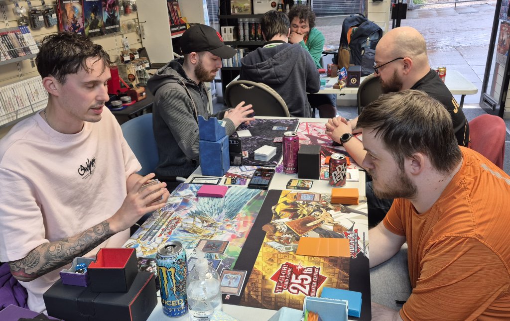 Alex, Leon and 13 other players engaged in Yu-Gi-Oh Tournament at the Guild of Games on Thu 05/06/2025
