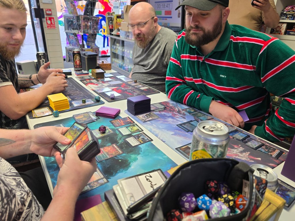 Four contestants locked in battle with their Magic: The Gathering Final Fantasy decks on the official release date, 07/06/2025.