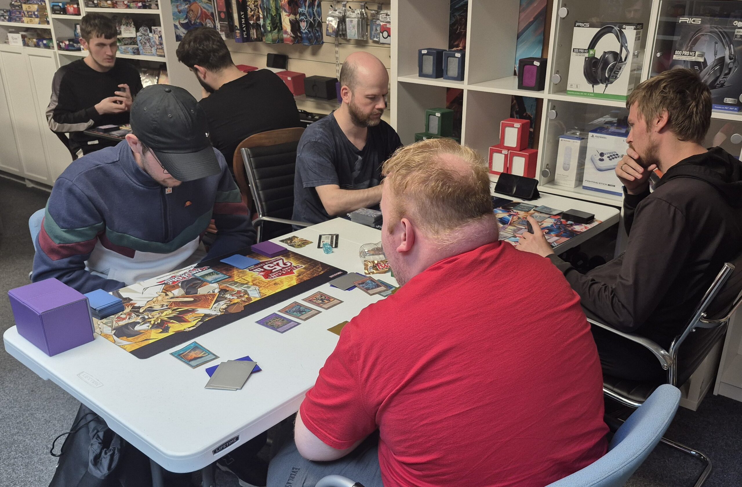 Six Players Duelling in the Yu-Gi-Oh tournament on 07/08/2025 at the Guild of Games